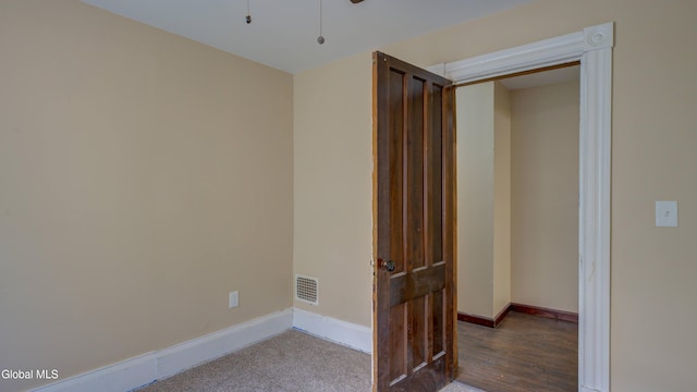 200 Fon Clair St, Johnstown, NY 12095 - unfurnished bedroom with baseboards and wood finished floors
