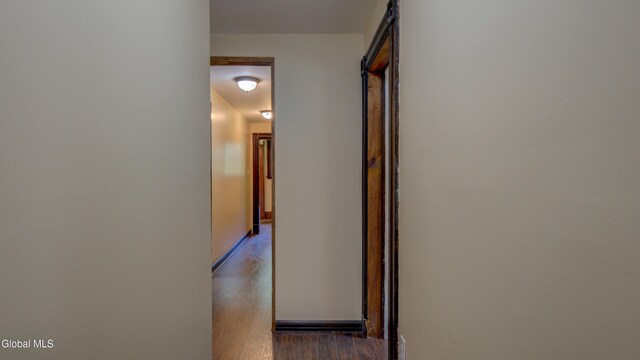 200 Fon Clair St, Johnstown, NY 12095 - corridor featuring dark wood finished floors and baseboards