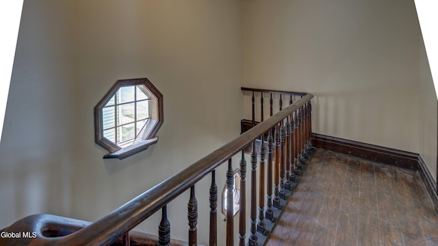 200 Fon Clair St, Johnstown, NY 12095 - staircase featuring baseboards and wood-type flooring