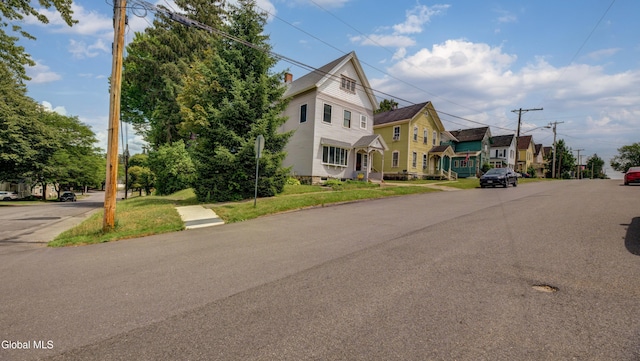 200 Fon Clair St, Johnstown, NY 12095 - view of asphalt street featuring a residential view and sidewalks