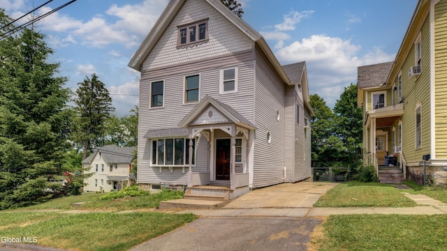 200 Fon Clair St, Johnstown, NY 12095 - victorian home featuring a front lawn