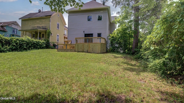 200 Fon Clair St, Johnstown, NY 12095 - back of house featuring a yard and a deck