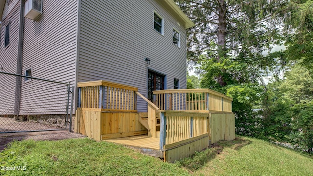 200 Fon Clair St, Johnstown, NY 12095 - back of house featuring a deck and a yard