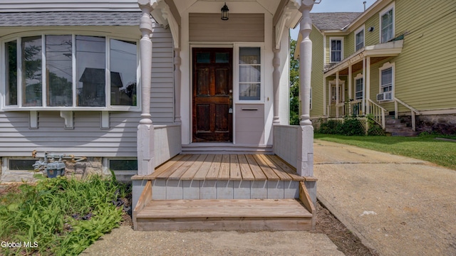 200 Fon Clair St, Johnstown, NY 12095 - doorway to property with a porch