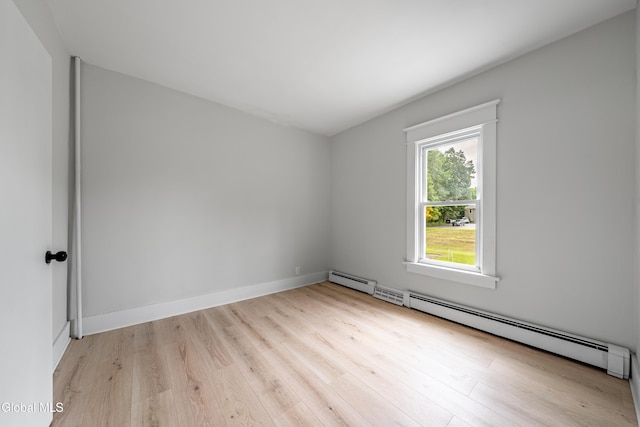 1012 Princetown Rd, Rotterdam, NY 12306 - spare room with a baseboard radiator and light wood-type flooring