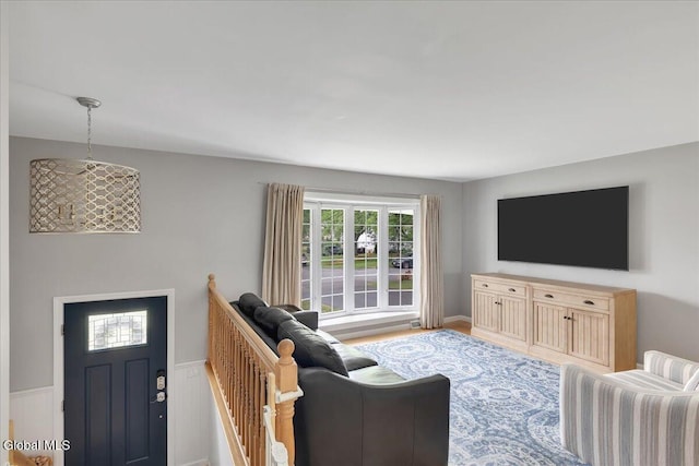 33 Comely Ln, Colonie, NY 12110 - living room featuring a wainscoted wall