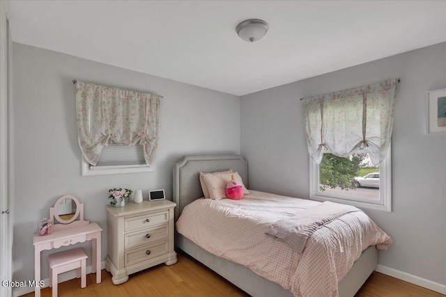 33 Comely Ln, Colonie, NY 12110 - bedroom with light wood-style floors