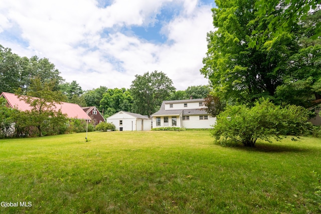 98 Meadowbrook Rd, Saratoga Springs, NY 12866 - view of green lawn with a garage
