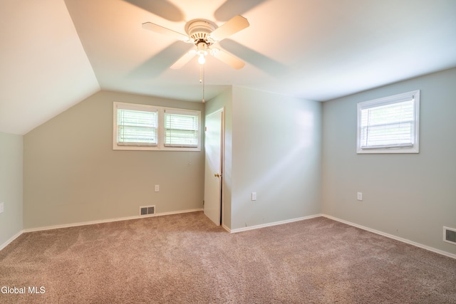 98 Meadowbrook Rd, Saratoga Springs, NY 12866 - bonus room with healthy amount of natural light, carpet, ceiling fan, and lofted ceiling