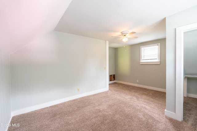98 Meadowbrook Rd, Saratoga Springs, NY 12866 - unfurnished bedroom featuring carpet, lofted ceiling, and ceiling fan