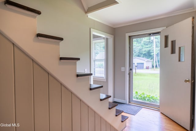 98 Meadowbrook Rd, Saratoga Springs, NY 12866 - foyer entrance featuring light wood-style floors, stairway, and crown molding
