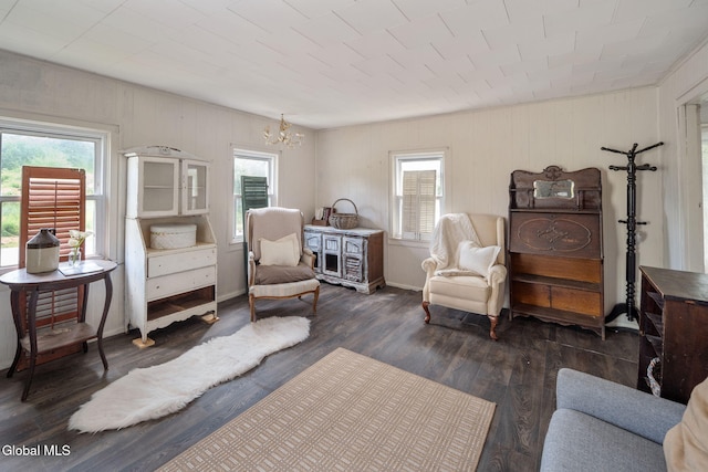 5530 State Highway 30a, Charleston, NY 12066 - living area with healthy amount of natural light, a chandelier, wood finished floors, and wood walls