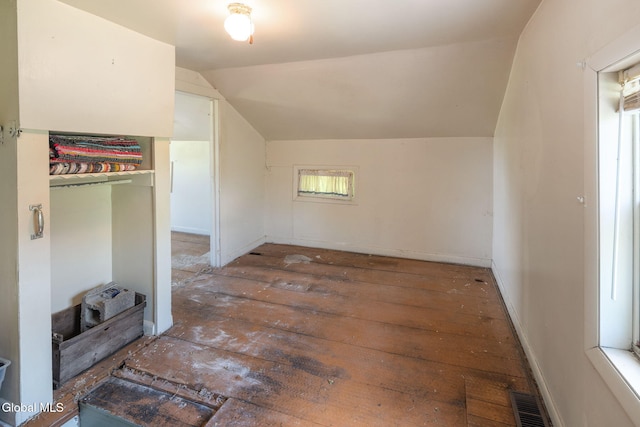 5530 State Highway 30a, Charleston, NY 12066 - unfurnished bedroom featuring lofted ceiling and hardwood / wood-style flooring