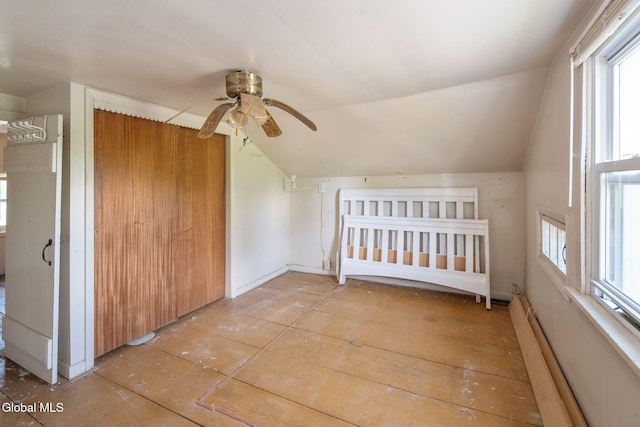 5530 State Highway 30a, Charleston, NY 12066 - additional living space featuring lofted ceiling, plenty of natural light, ceiling fan, and baseboard heating