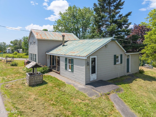 5530 State Highway 30a, Charleston, NY 12066 - view of front of property featuring a front lawn and a metal roof