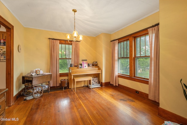 1659 State Route 7, Cobleskill, NY 12043 - office with hardwood / wood-style flooring, plenty of natural light, a chandelier, and ornamental molding