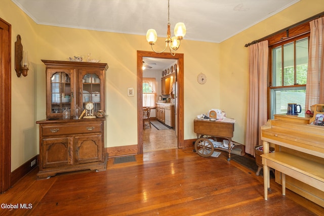1659 State Route 7, Cobleskill, NY 12043 - corridor featuring a chandelier, crown molding, and dark wood-type flooring