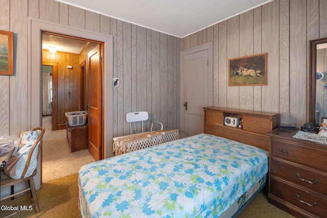 1659 State Route 7, Cobleskill, NY 12043 - bedroom featuring wood walls, carpet flooring, and crown molding