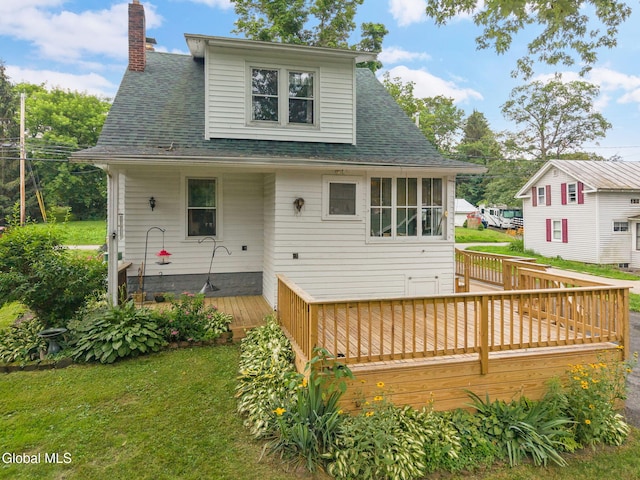 1659 State Route 7, Cobleskill, NY 12043 - back of property featuring a deck, roof with shingles, a chimney, and a yard
