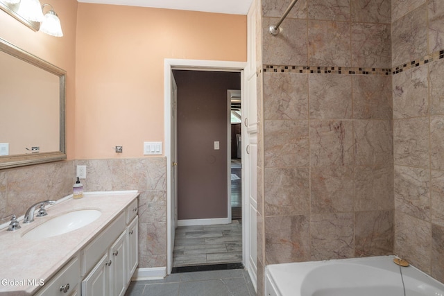 654 Sand Creek Rd, Colonie, NY 12205 - bathroom with vanity, tile walls, and shower / bathtub combination