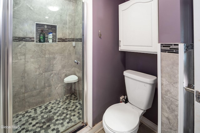 654 Sand Creek Rd, Colonie, NY 12205 - bathroom with a shower stall and toilet