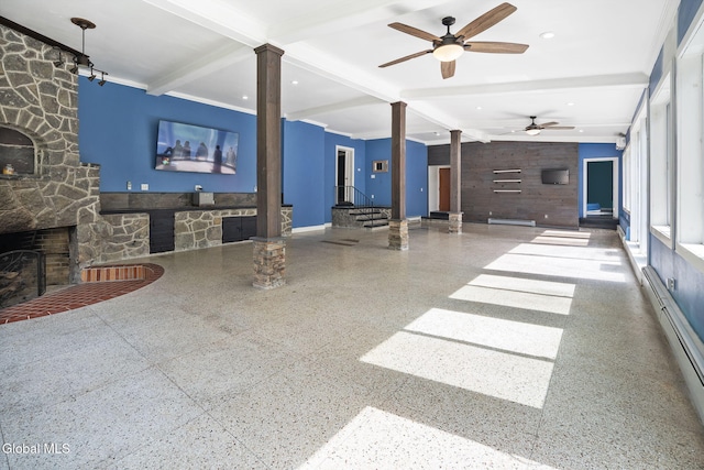 654 Sand Creek Rd, Colonie, NY 12205 - unfurnished living room with a fireplace, baseboard heating, decorative columns, beamed ceiling, and ceiling fan