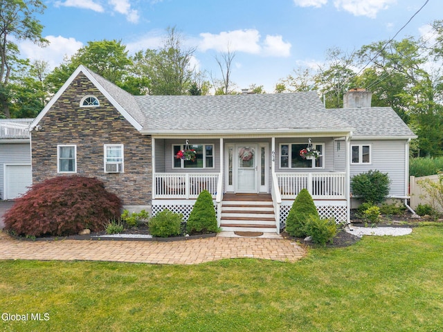 654 Sand Creek Rd, Colonie, NY 12205 - view of front facade featuring a front yard, a chimney, a porch, a shingled roof, and stone siding