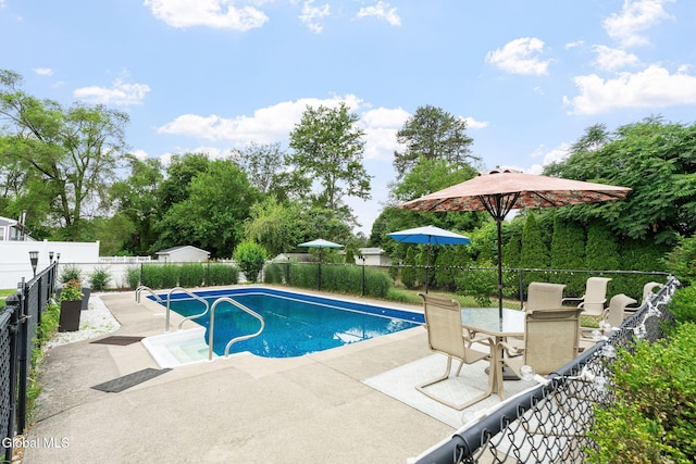 27 Terry Ave, Guilderland, NY 12303 - view of swimming pool with a patio, a fenced backyard, and outdoor dining area