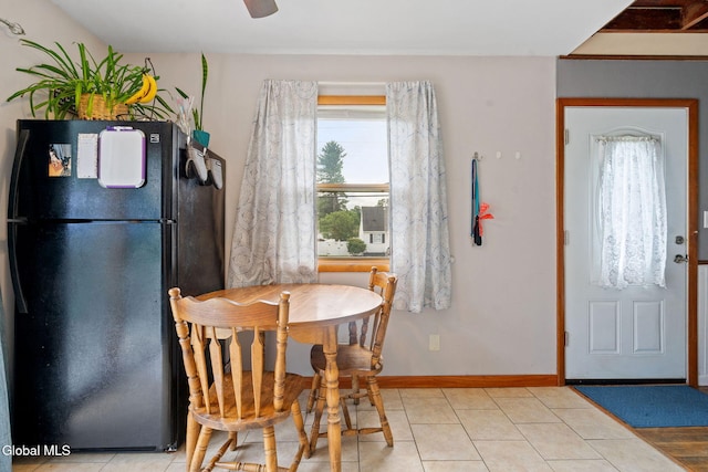 27 Terry Ave, Guilderland, NY 12303 - dining room featuring light tile patterned floors and a ceiling fan