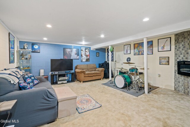 27 Terry Ave, Guilderland, NY 12303 - living area with carpet, recessed lighting, and a glass covered fireplace