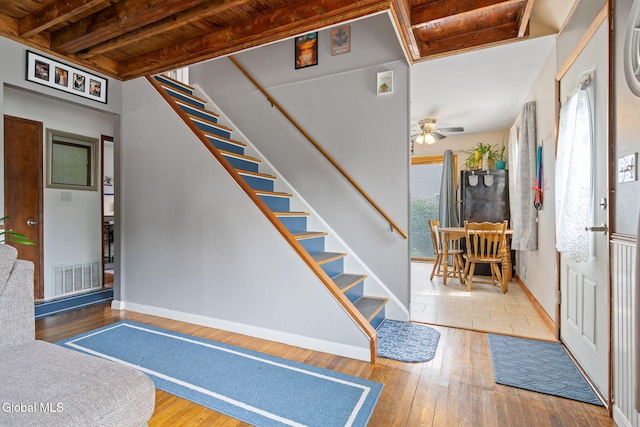 27 Terry Ave, Guilderland, NY 12303 - stairs with hardwood / wood-style floors, a wooden ceiling with exposed beams, and ceiling fan