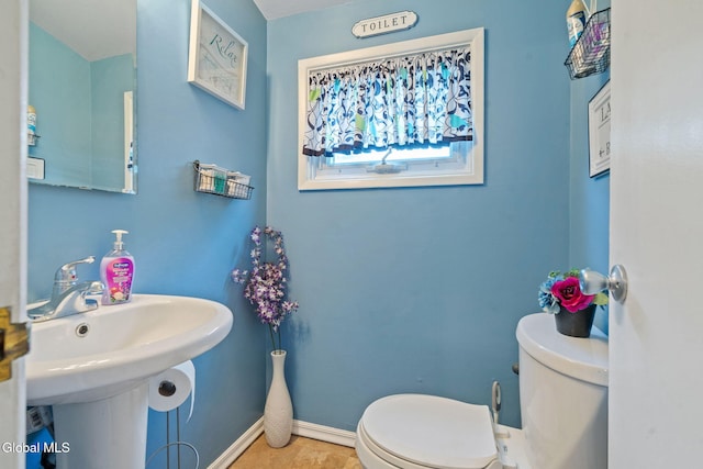 27 Terry Ave, Guilderland, NY 12303 - half bathroom with toilet and baseboards