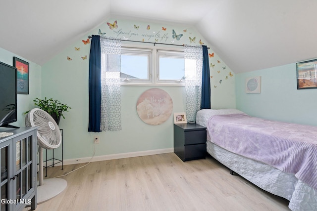 27 Terry Ave, Guilderland, NY 12303 - bedroom featuring wood finished floors and vaulted ceiling
