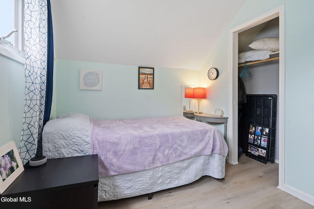 27 Terry Ave, Guilderland, NY 12303 - bedroom featuring wood finished floors and lofted ceiling