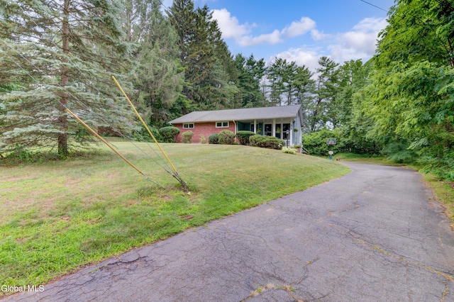 909 Ash Tree Ln, Niskayuna, NY 12309 - view of front of property with a front lawn and brick siding