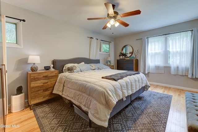 909 Ash Tree Ln, Niskayuna, NY 12309 - bedroom featuring light wood-type flooring and a ceiling fan