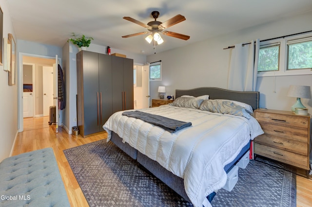 909 Ash Tree Ln, Niskayuna, NY 12309 - bedroom with light wood-style flooring and a ceiling fan