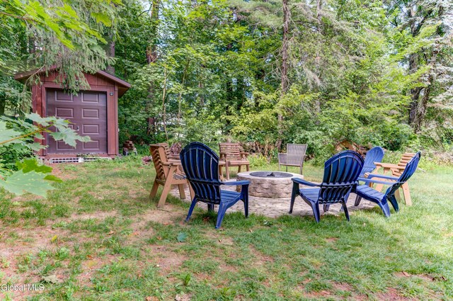 909 Ash Tree Ln, Niskayuna, NY 12309 - view of green lawn with a fire pit