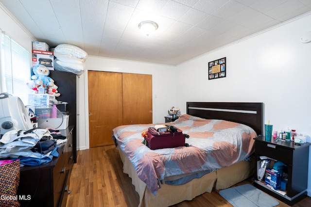 8-10 Spruce St, Rensselaer, NY 12144 - bedroom with wood finished floors and crown molding