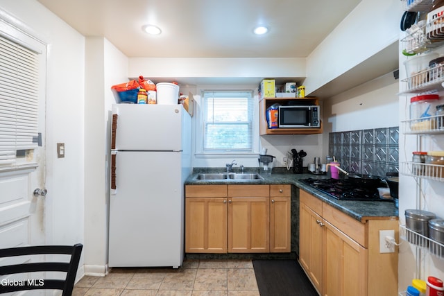 8-10 Spruce St, Rensselaer, NY 12144 - kitchen featuring freestanding refrigerator, dark countertops, black gas cooktop, open shelves, and recessed lighting
