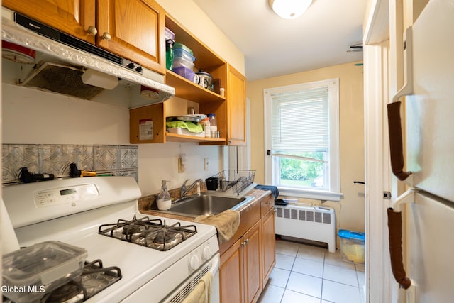 8-10 Spruce St, Rensselaer, NY 12144 - kitchen featuring white appliances, radiator heating unit, open shelves, light tile patterned floors, and light countertops