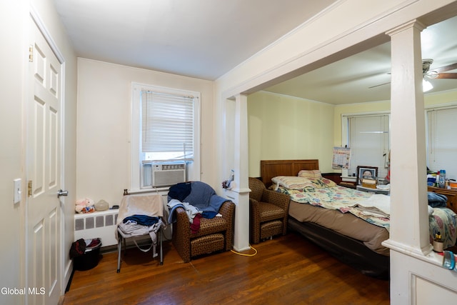8-10 Spruce St, Rensselaer, NY 12144 - bedroom with wood finished floors, radiator, cooling unit, crown molding, and decorative columns