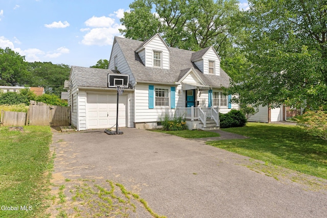 1226 Sumner Ave, Schenectady, NY 12309 - cape cod house with driveway, an attached garage, and a shingled roof