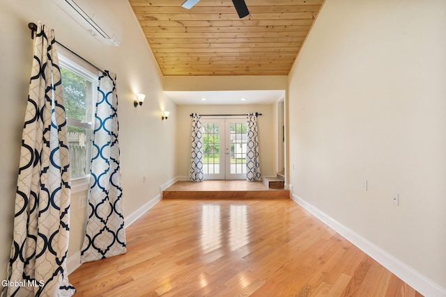 1226 Sumner Ave, Schenectady, NY 12309 - unfurnished room with french doors, wood finished floors, ceiling fan, lofted ceiling, and an AC wall unit