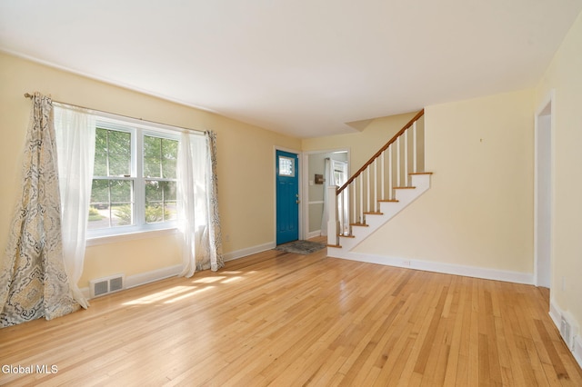 1226 Sumner Ave, Schenectady, NY 12309 - foyer with light wood-style floors and stairs