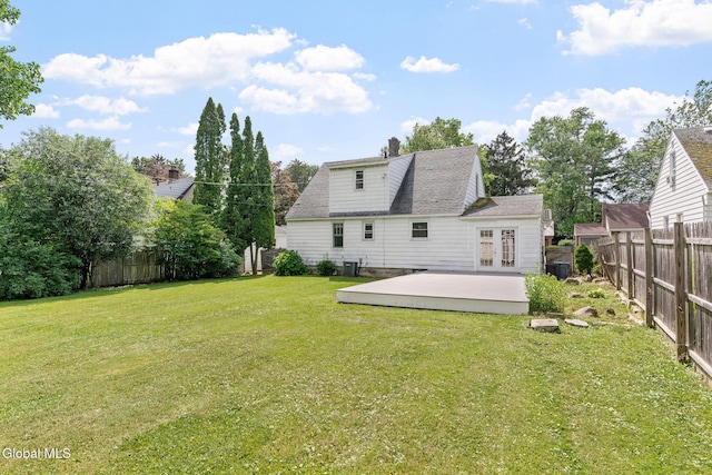 1226 Sumner Ave, Schenectady, NY 12309 - rear view of house featuring french doors, a fenced backyard, and a deck