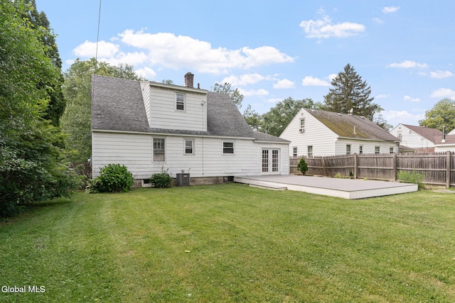 1226 Sumner Ave, Schenectady, NY 12309 - back of house featuring a patio, a chimney, french doors, and roof with shingles