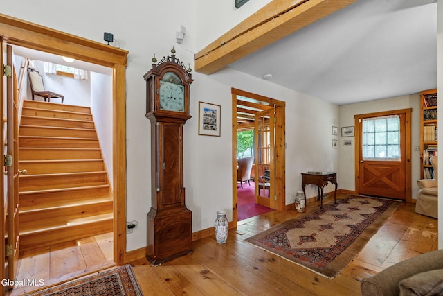 135 Willow St, Guilderland, NY 12084 - foyer entrance featuring hardwood / wood-style flooring, plenty of natural light, and stairway