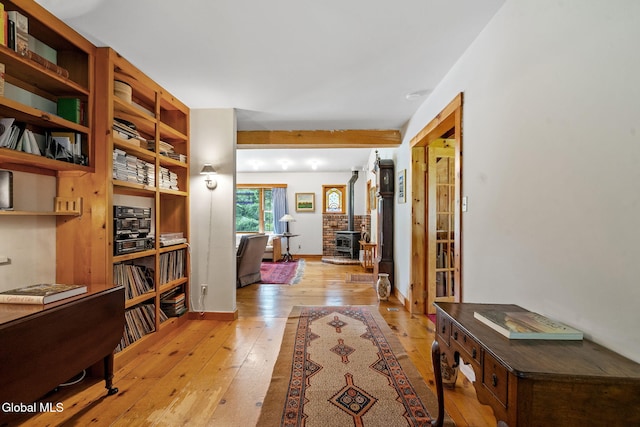 135 Willow St, Guilderland, NY 12084 - office space featuring light wood-type flooring and a wood stove