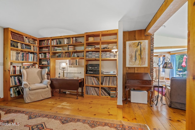 135 Willow St, Guilderland, NY 12084 - living area with hardwood / wood-style flooring and lofted ceiling